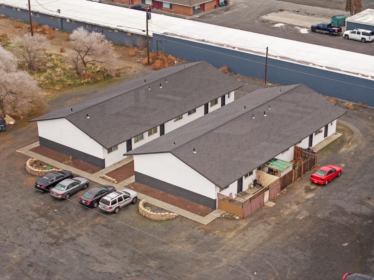 Aerial view of a 12-unit apartment property in Moses Lake, Washington, with a new pitched roof