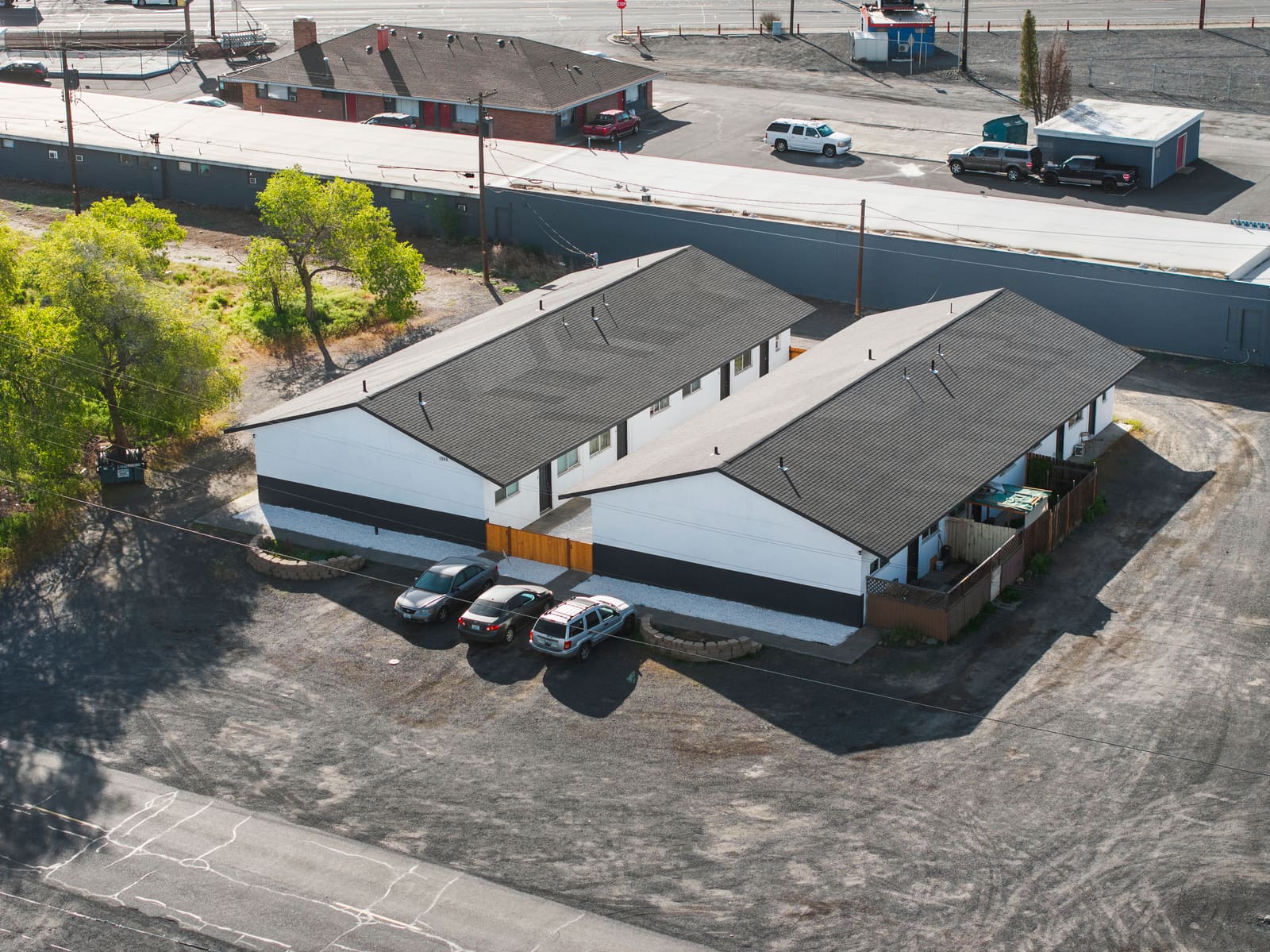 Aerial view of the 12-unit apartment property in Moses Lake with its new pitched roof