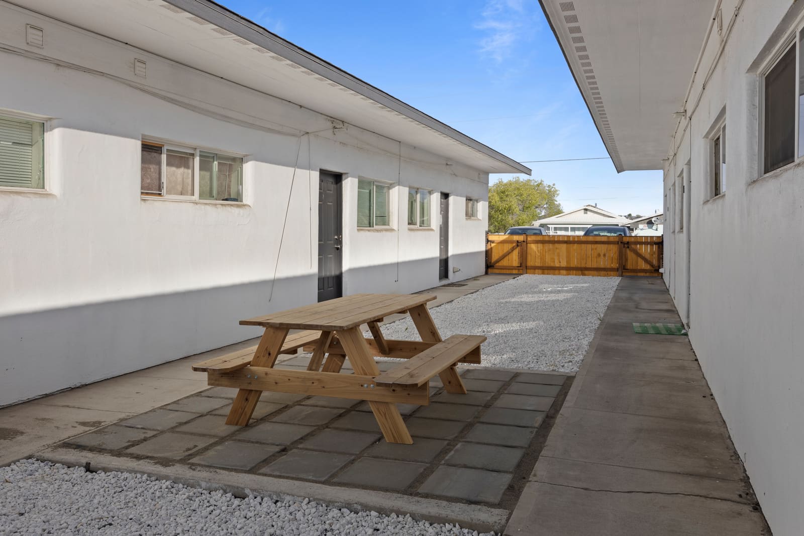 Resident courtyard with picnic seating at the 12-unit apartment property in Moses Lake