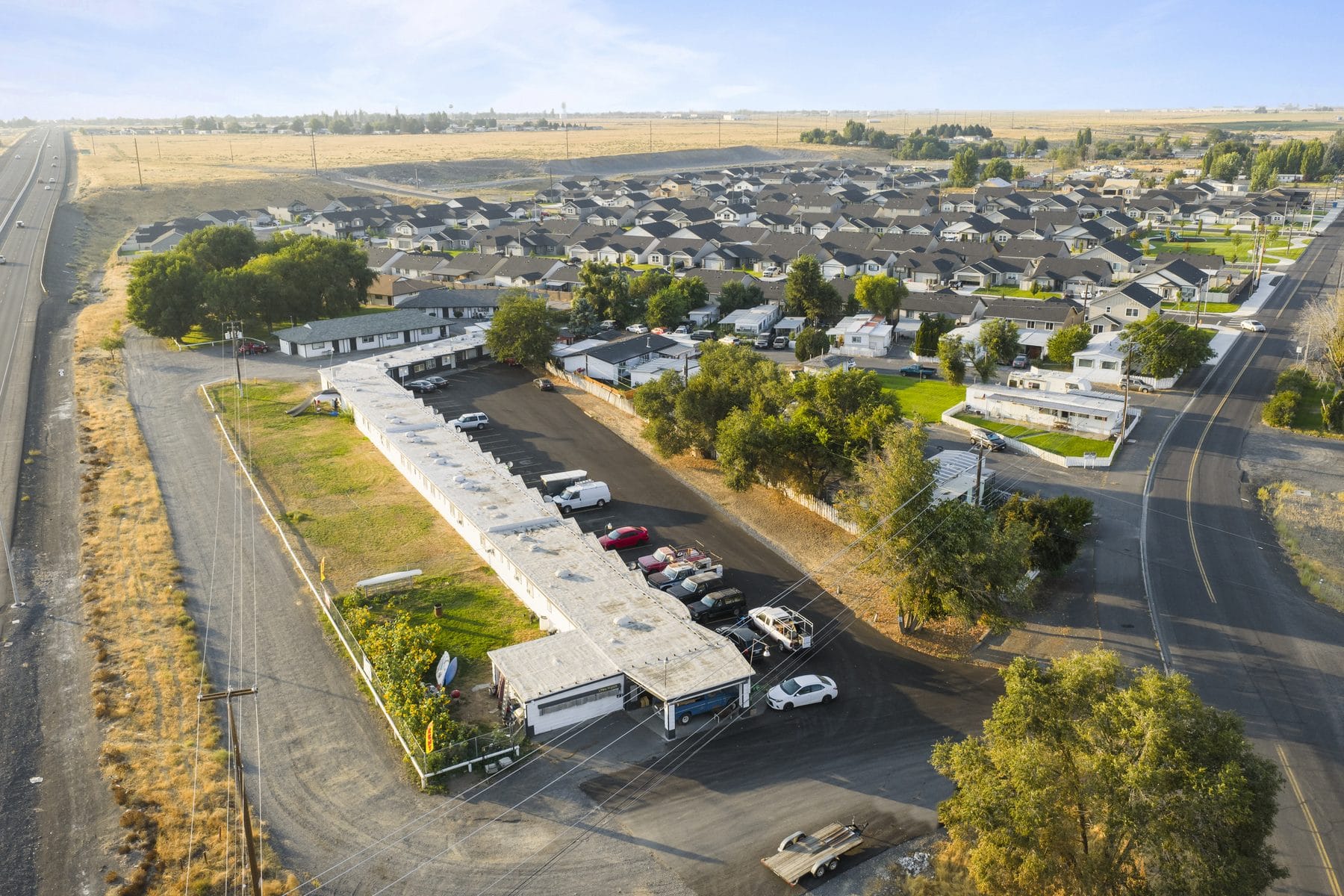 Golden-hour aerial view of a 39-unit apartment community in Moses Lake, Washington